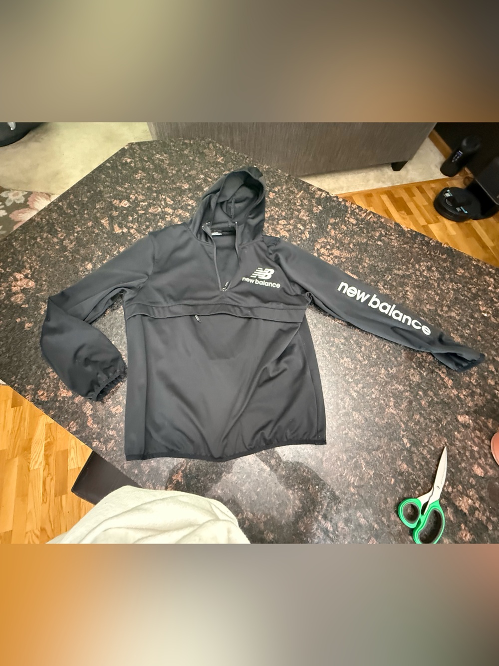 New Balance Women’s Black Hooded warm-up jacket with Logo Sleeve